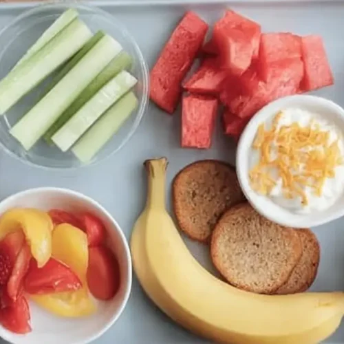 Various appealing after school snacks neatly arranged on a table for kids.