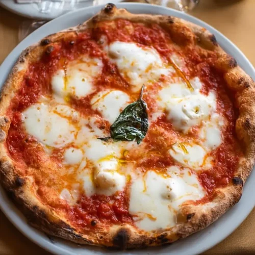 A close-up shot of a freshly baked Italian pizza with rich toppings.