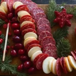 Delicious Christmas appetizers elegantly presented on a table adorned with holiday decorations.