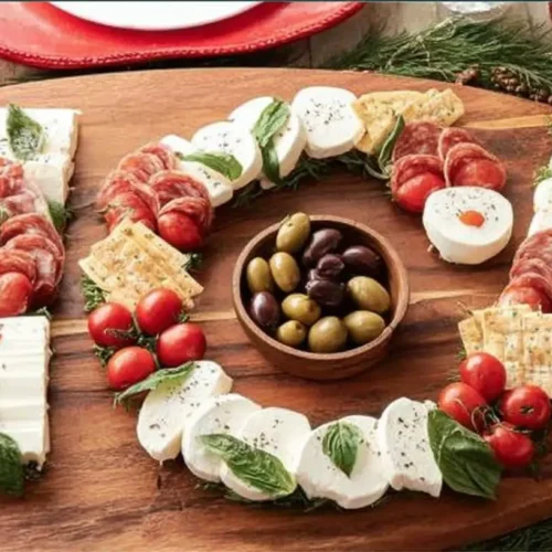 A full table set for a lavish Christmas dinner during the evening.