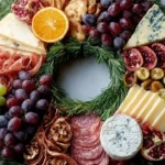A vibrant spread of Christmas food items arranged beautifully for a holiday gathering.