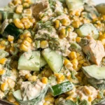 Creamy cucumber salad infused with street corn flavors, presented beautifully.