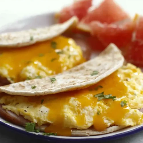 A collection of easy egg recipes displayed attractively on a rustic table.