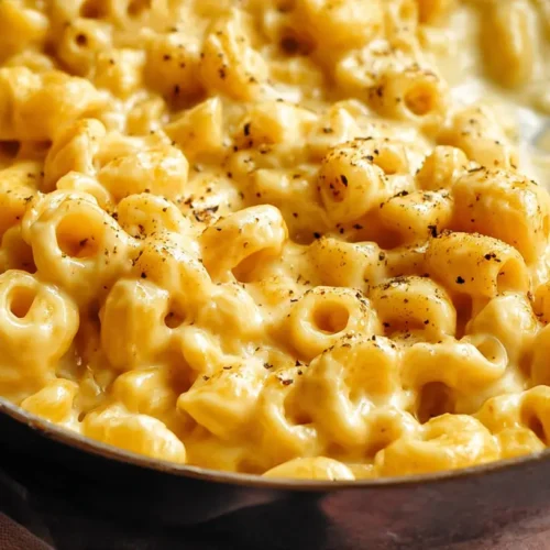A serving of creamy stovetop macaroni and cheese in a bowl