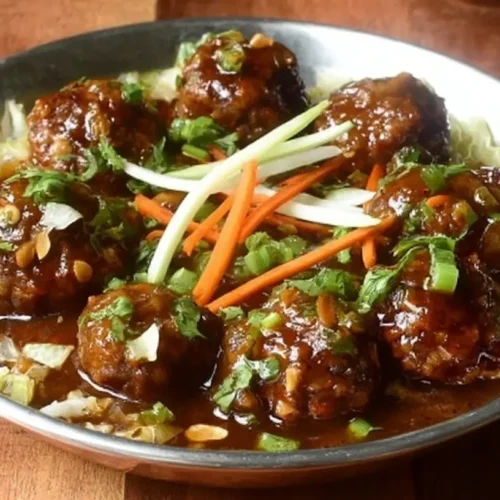 A serving of delicious Cabbage Manchurian ready to be eaten.