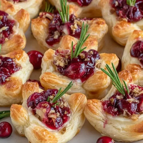 Close-up of cranberry brie bites, perfectly golden brown