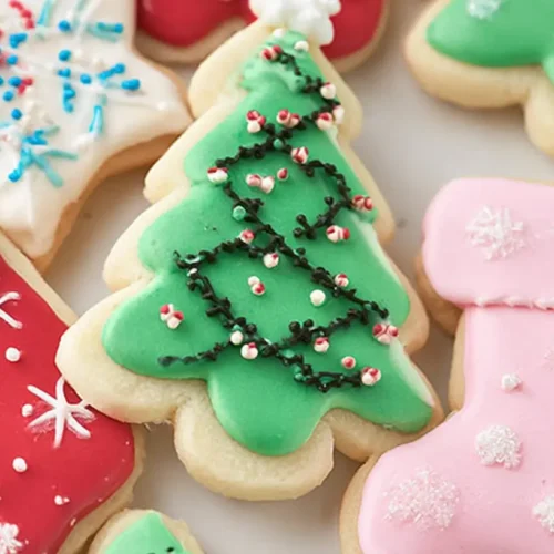 Decorative sugar cookie icing applied with precision on a cookie.