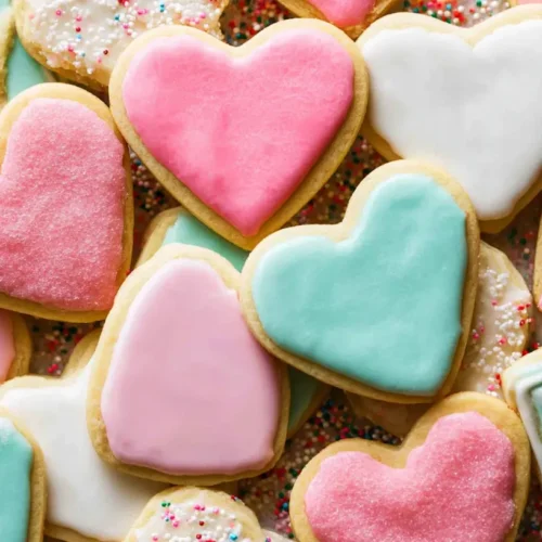 A plate of freshly baked sugar cookies ready to be decorated