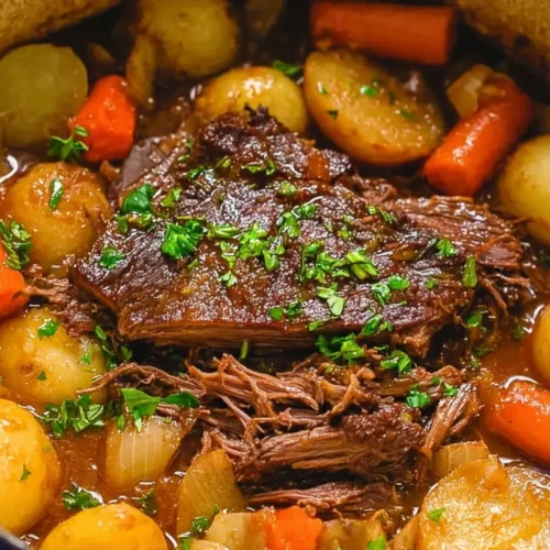 A tender Dutch Oven Pot Roast, ready to serve