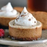 A serving of charming no-bake gingerbread cheesecake cups, ready to enjoy.