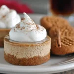 A trio of delicious no-bake gingerbread cheesecake cups presented artfully.