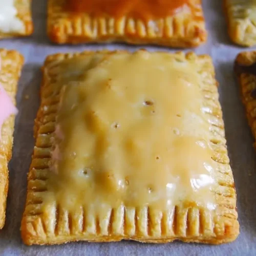 Homemade Pop Tarts with a flaky crust and fruit filling.