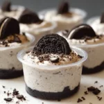 A close-up of delicious Cookies and Cream Dessert Cups, showing distinct layers.