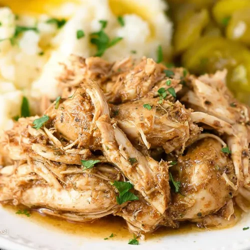 A platter of savory Mississippi Chicken, slow-cooked to perfection