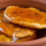 Freshly made sopaipillas, light and fluffy texture, ready to be served