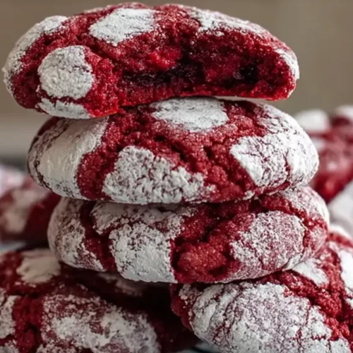 Delicious red velvet crinkle cookies dusted with powdered sugar