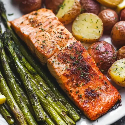 Sheet pan salmon with asparagus and potatoes, perfectly roasted together.