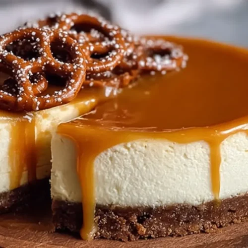 A rich white chocolate salted caramel cheesecake, freshly prepared.
