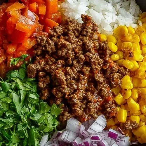 A simple and delicious budget ground beef dinner bowl with rice and vegetables