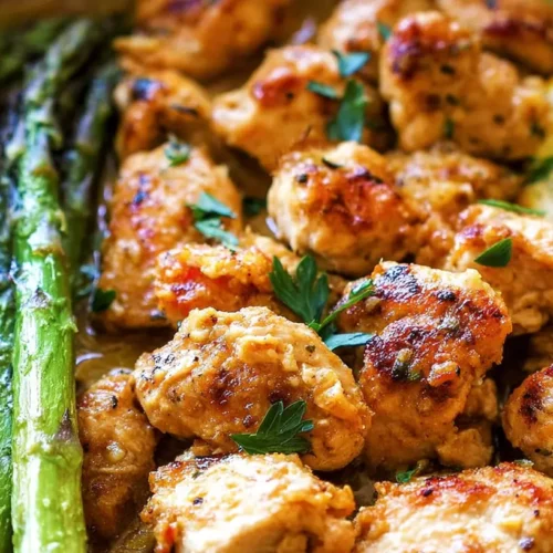 A complete one-pan garlic butter chicken dinner with vegetables, roasted to perfection.