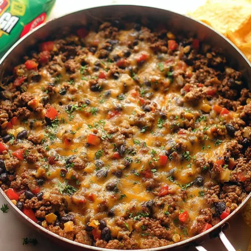 A hot ground beef skillet meal with vegetables ready to serve