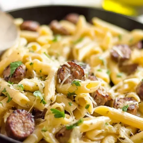 A delicious sausage and pasta skillet dinner cooked in a single pan.