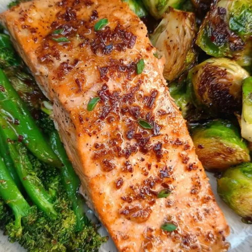A plated 20-minute easy salmon dinner, perfectly cooked with a crispy skin.