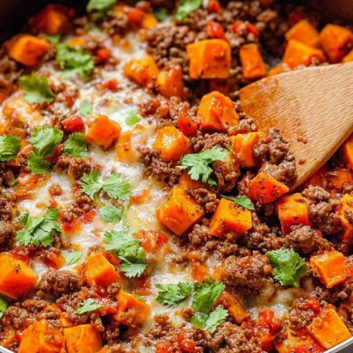 A full pan of ground beef and sweet potato skillet cooked to perfection.