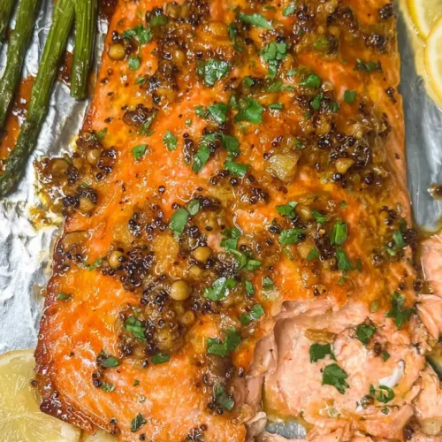 A perfectly cooked high-protein salmon dinner, flaked and ready to eat.