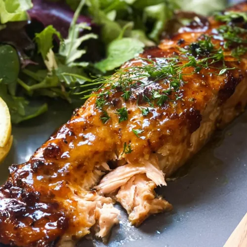A serving of light honey mustard salmon, beautifully glazed and ready to eat.