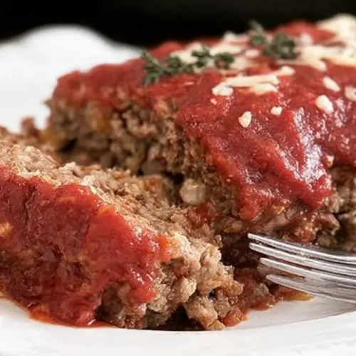 A dish of fully cooked oven baked ground turkey, ready to serve.