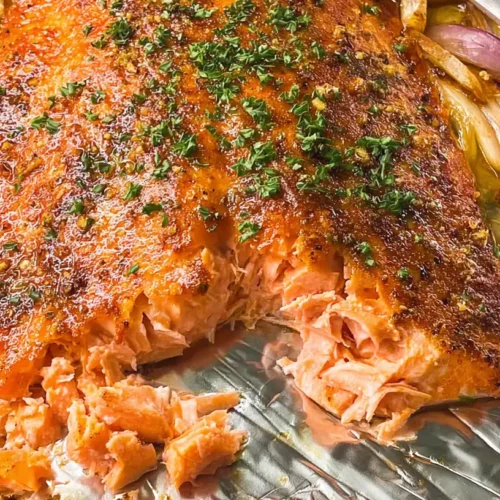 Perfect oven baked salmon fillet, flaked and ready to serve