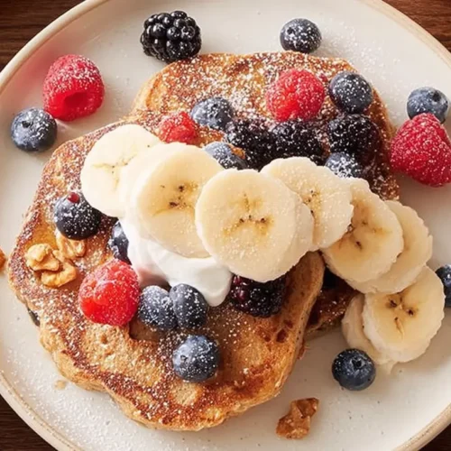 A vibrant flat lay showcasing various easy breakfast ideas like fruit, yogurt, and toast.