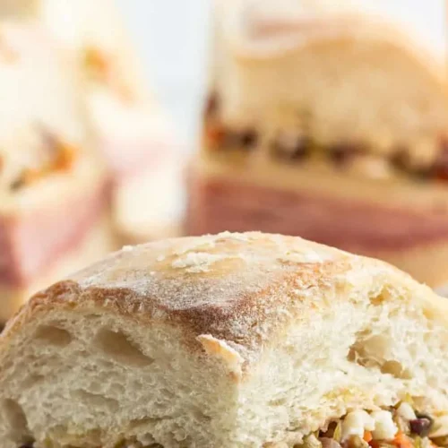 A New Orleans muffuletta sandwich with olive salad and various meats