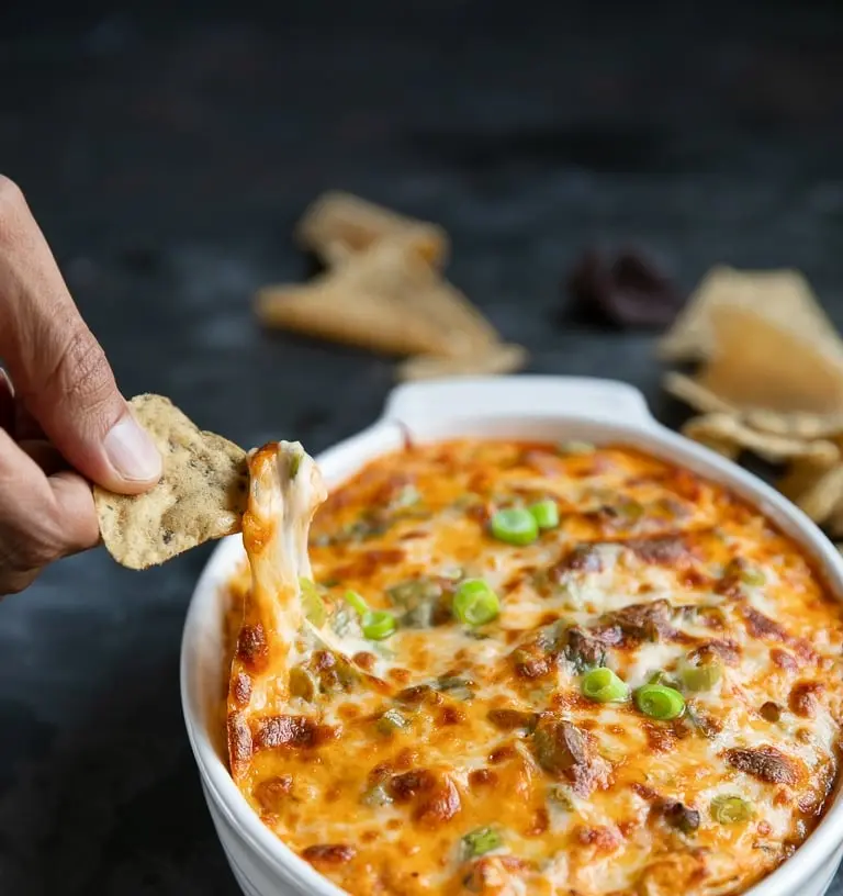 A creamy and delicious buffalo chicken dip in a serving dish.