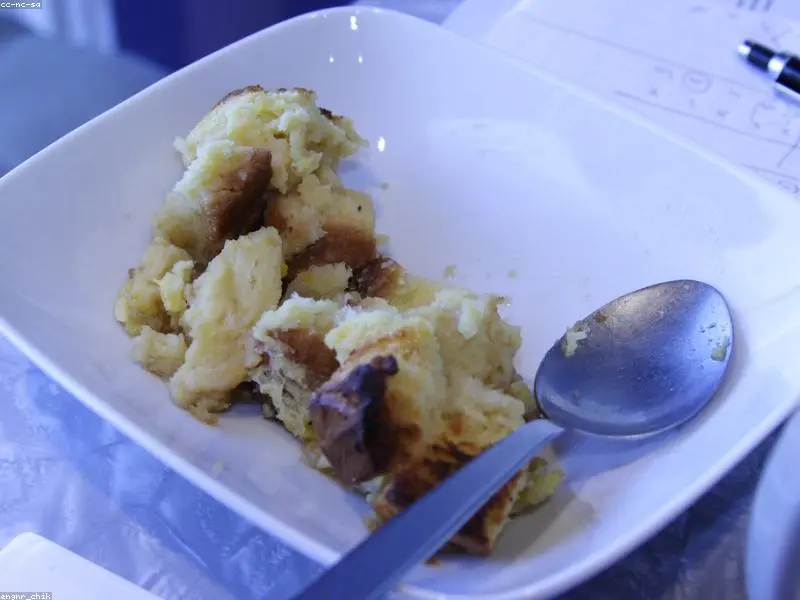 A hot and delicious cheesy breakfast casserole, freshly baked and golden brown.