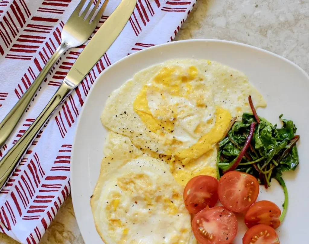 A table spread with various healthy breakfasts with simple ingredients like fruit and oats.