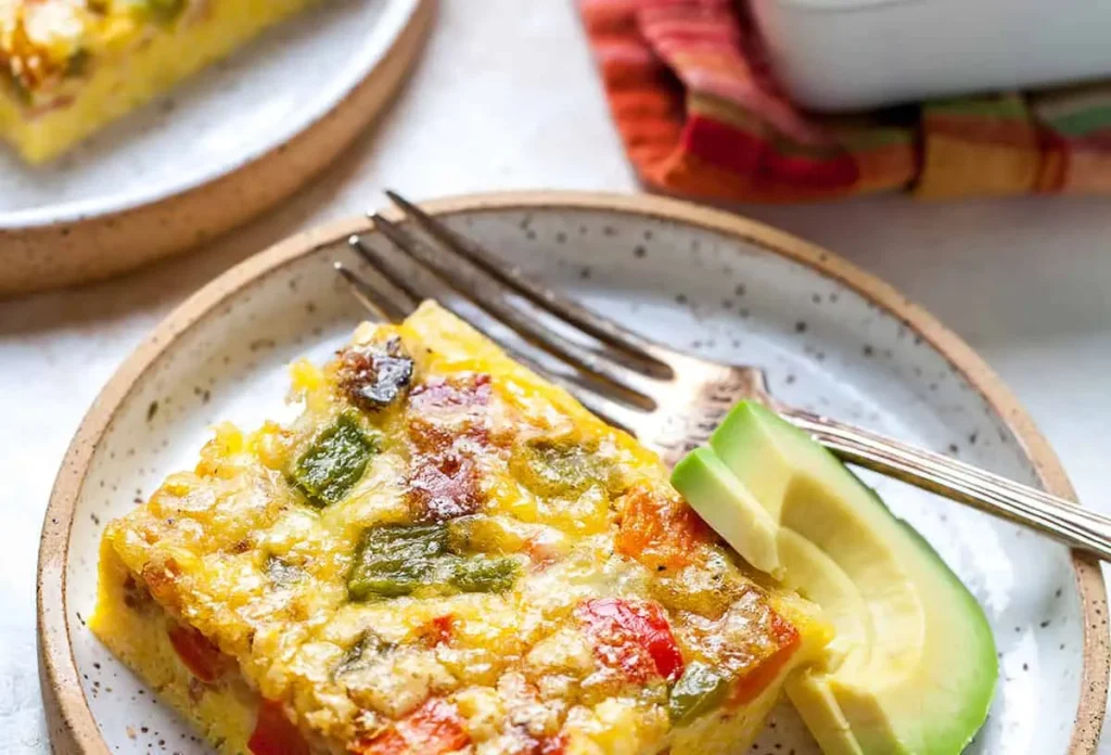 A healthy egg breakfast casserole baked with colorful vegetables.
