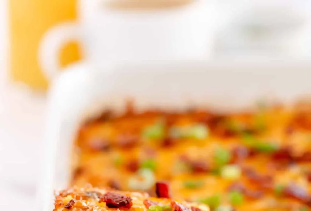 A hearty overnight breakfast casserole with eggs, cheese, and vegetables.