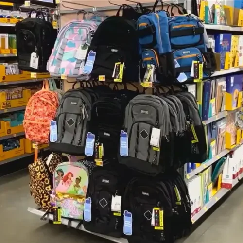 Collection of colorful school backpacks on sale in the USA retail store
