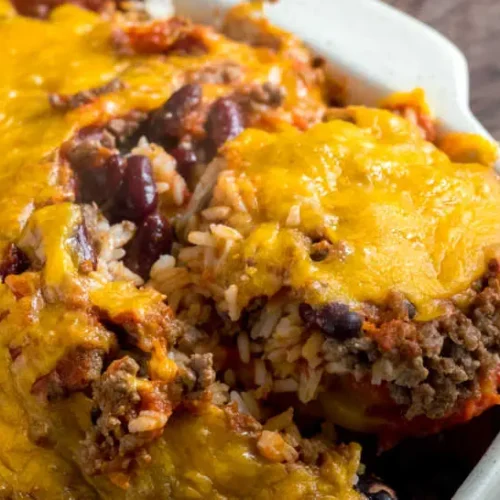 A bubbling shipwreck casserole in a baking dish, fresh from the oven.